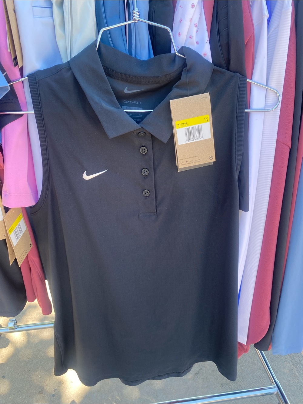 NWT Nike Women’s Black Sleeveless Golf Polo with White Swoosh, small